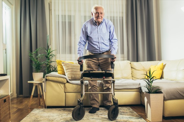 Elder man with walker